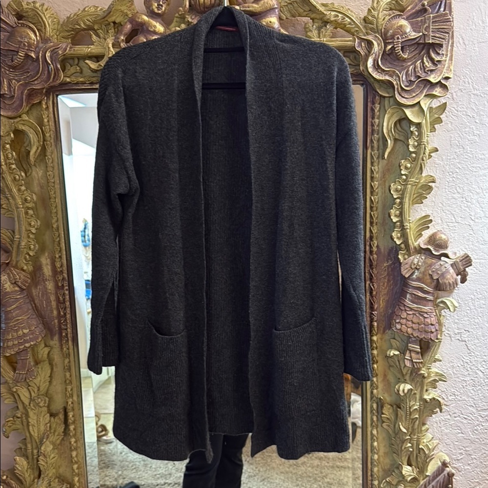 100% Cashmere shawl collar cardigan with pockets and side vents